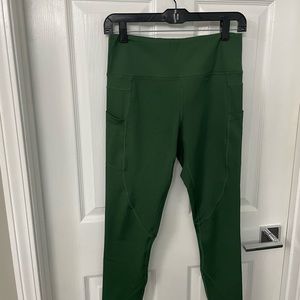 Zyia green leggings with side pockets, size 8-10